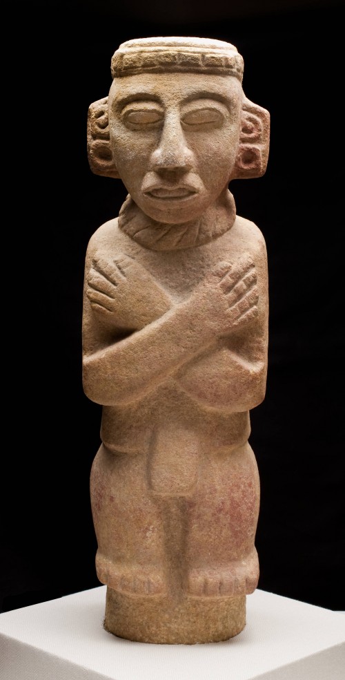 Standing Figure of a God with Crossed Arms